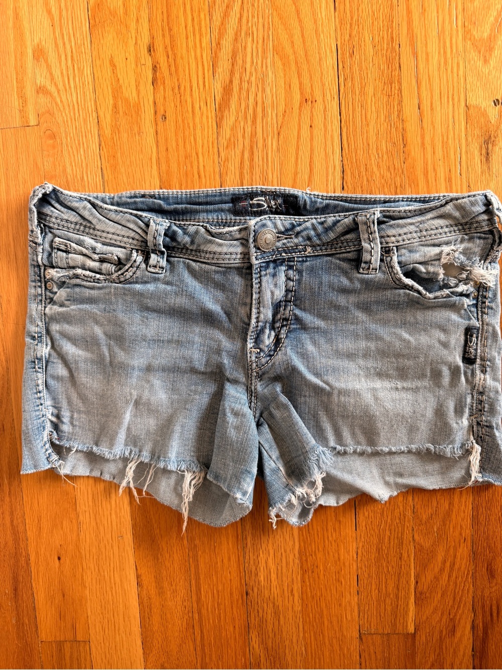 Silver Jeans Light Blue Distressed Low Rise Denim Shorts